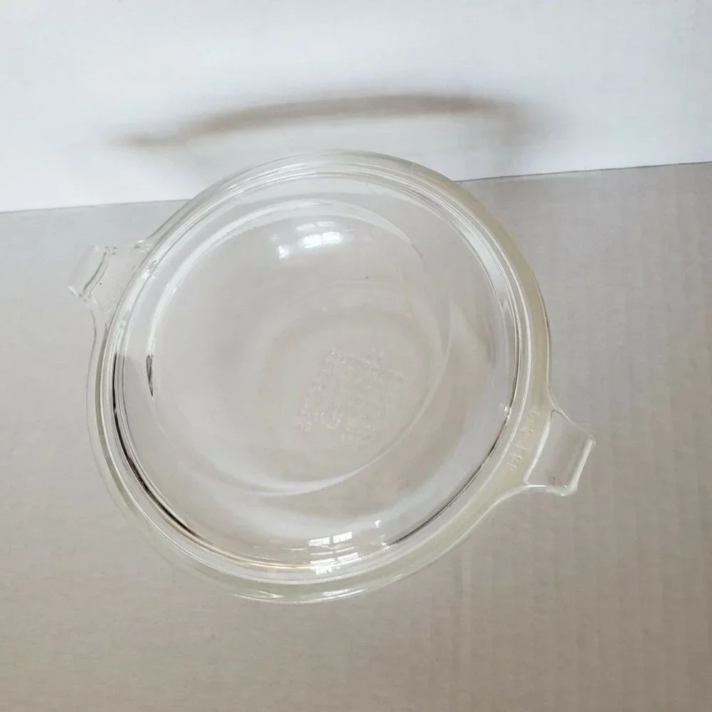Pyrex small glass Cinderella bowl with lid  handles